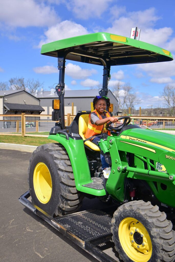 Girl on a tractor